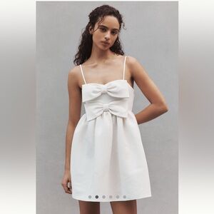 Anthropologie double bow pleated mini dress. Worn once for my bridal shower!